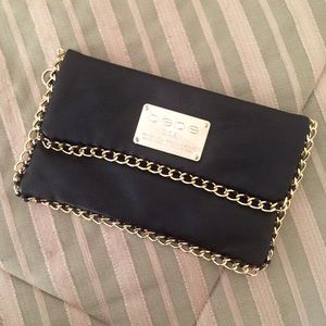 Bebe Chain Trim Faux Leather Clutch