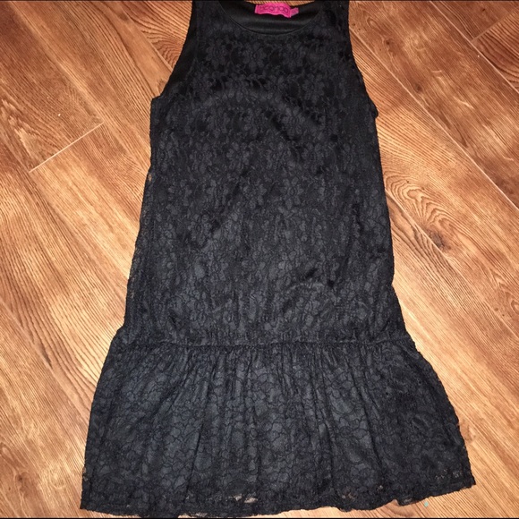 Sleeveless, black lace dress