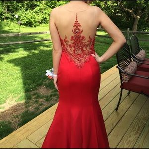 Red, embellished mermaid style prom dress.