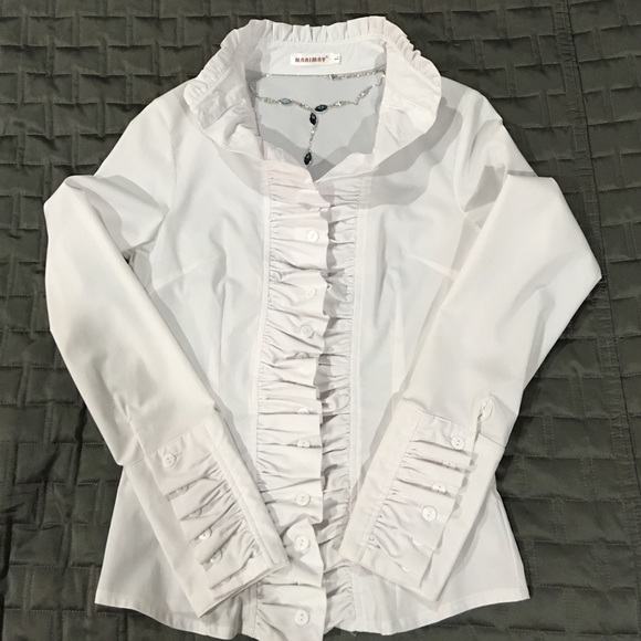 Elegant White Blouse with long sleeves.