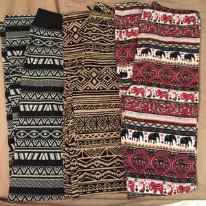 3 pairs of leggings with designs.
