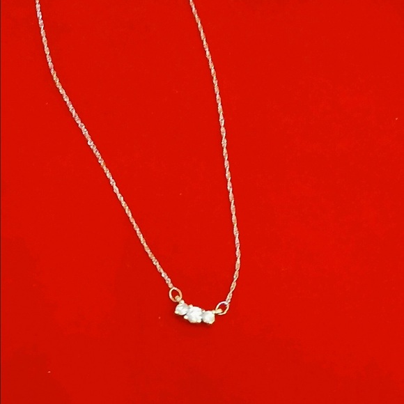 10k white gold necklace, with three real diamonds