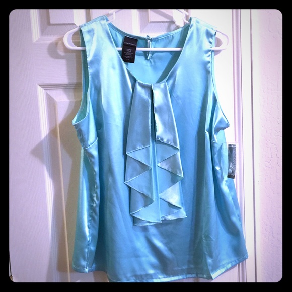 New adorable teal blouse.🎉