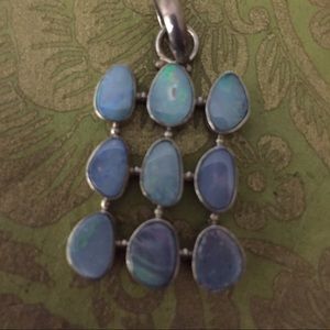 Australian opal hand crafted in sterling pendant.