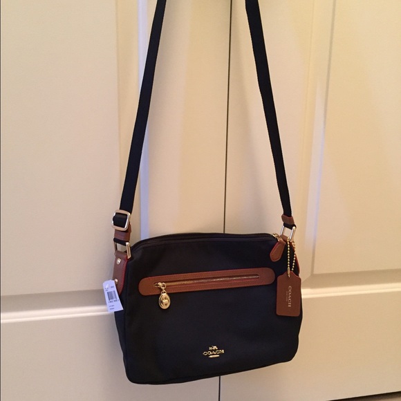 Coach Handbags - Coach Sawyer Crossbody Bag in Midnight Navy Canvas