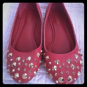 Red flats with gold stud detailing. Size 9