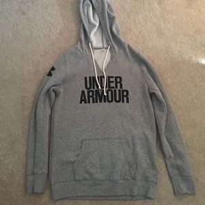 Under armour hoodie with pockets in front.