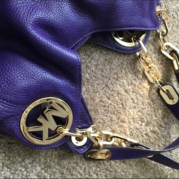 Purple Michael Kors pocketbook