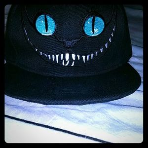 Cheshire cat snap back