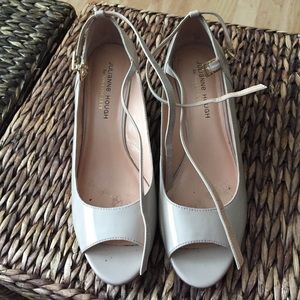 Open toe wedge with ankle strap.