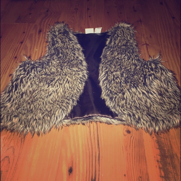 This is a Mudd Brand soft, fuzzy vest