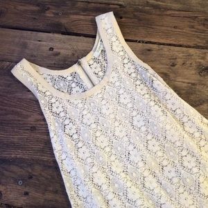 Cream tank top, with functioning zipper