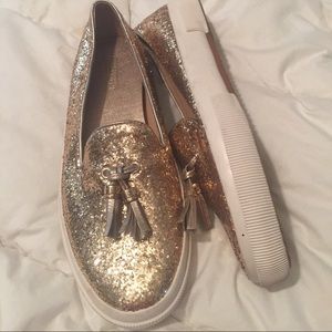 Authentic Coach slip ons