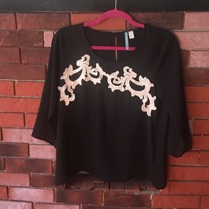 Black shirt with white embroidery