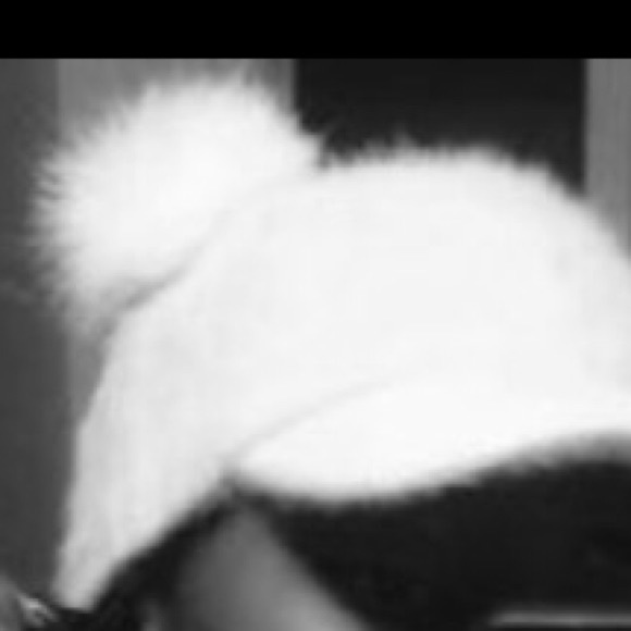 Hat , with 2 puff balls