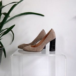 .wool and leather pumps.