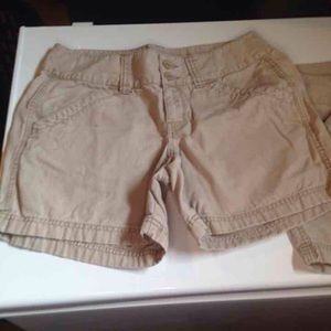 TWO PAIRS of North Face khaki shorts, sz 10