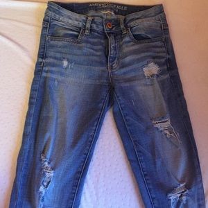 American Eagle medium wash destroyed jeans