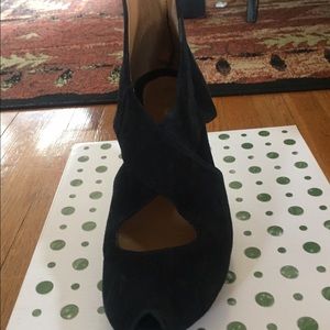 Black suede pair of booties