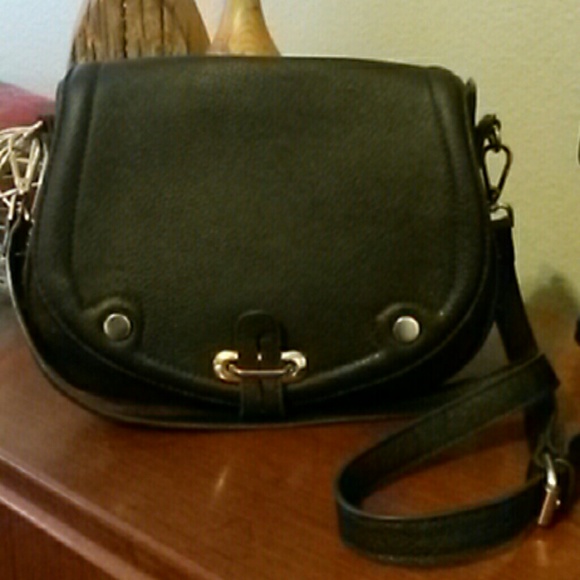 Black leather with brass accent saddlebag purse