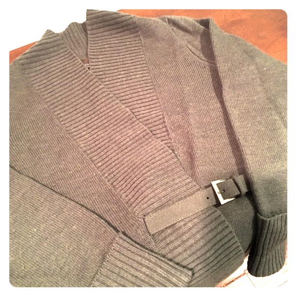 Belted sweater.