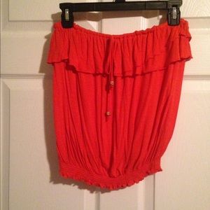 Flirty orange strapless top