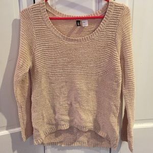 Oatmeal colored sweater.