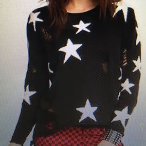 Black sweater with white stars