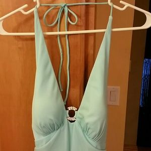 Backless, tie around the neck floor length dress.