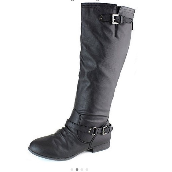 Black riding boots with black zipper
