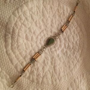 Wire bracelet with green stone