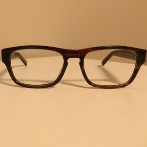 Warby Parker glasses.