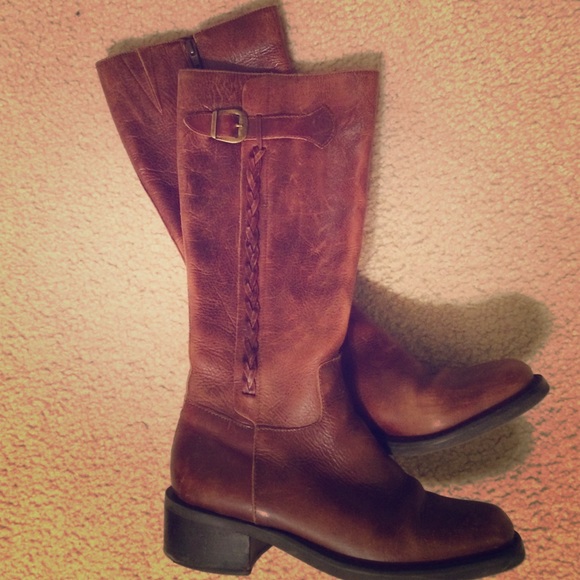 Tall brown leather riding boots