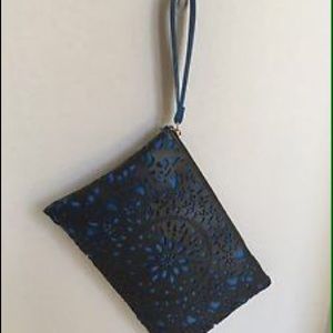 Carlos Santana Wristlet. New with tags