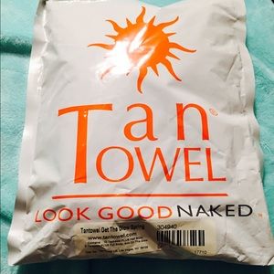New in bag never opened tan towel kit!