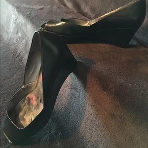 Black leather 3" wedge heels.