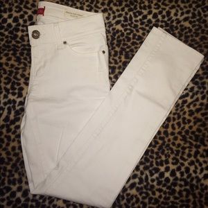 Guess white medium rise skinny jeans