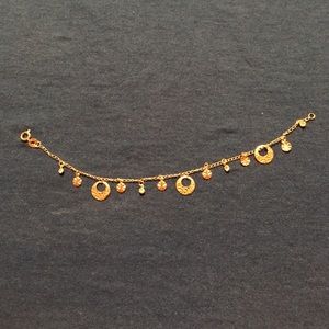 Charm bracelet. (Gold fill)certified 18k
