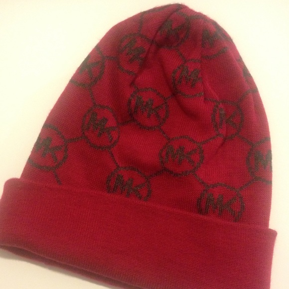 Michael Kors beanie hat! Color is red wine.