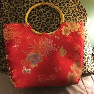 Asian/Chinese bamboo handle red bag