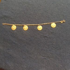 Coin charm bracelet. (Gold fill) certified 18k