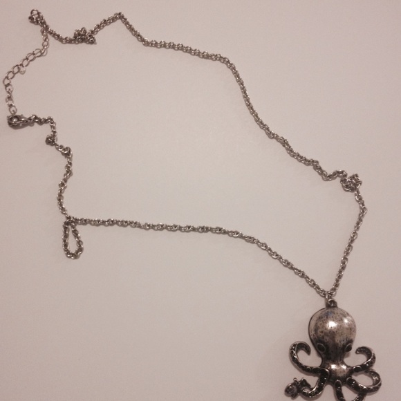 12 inch Silver Octopus catching fish necklace.