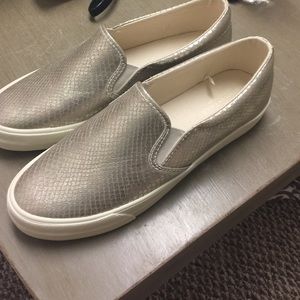 Gold snakeskin slip on sneakers