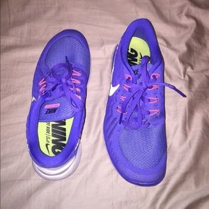 Purple Nike Free 5.0 running shoes, size 8