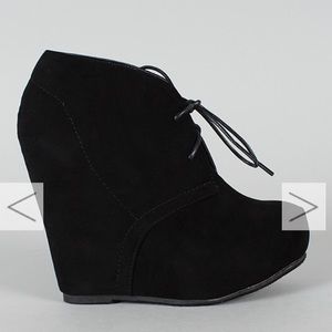 Black faux suede wedge booties