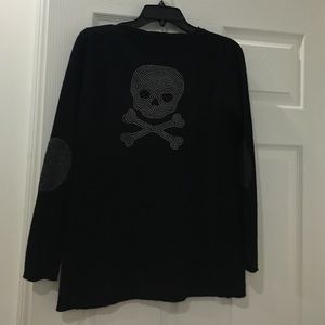Black sweater with studded skull on back