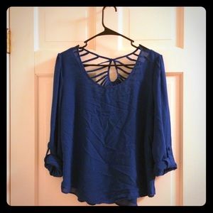 Blue blouse with caged back Blue blouse with caged back
