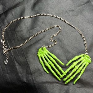 Psychobilly skeleton hands necklace