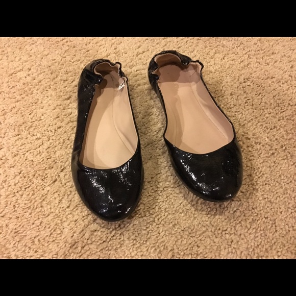 Shiny black ballet flats
