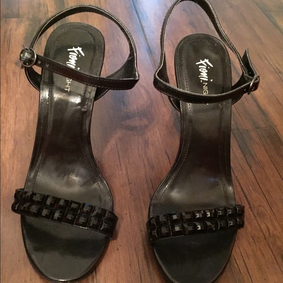 Black leather heels with single strap